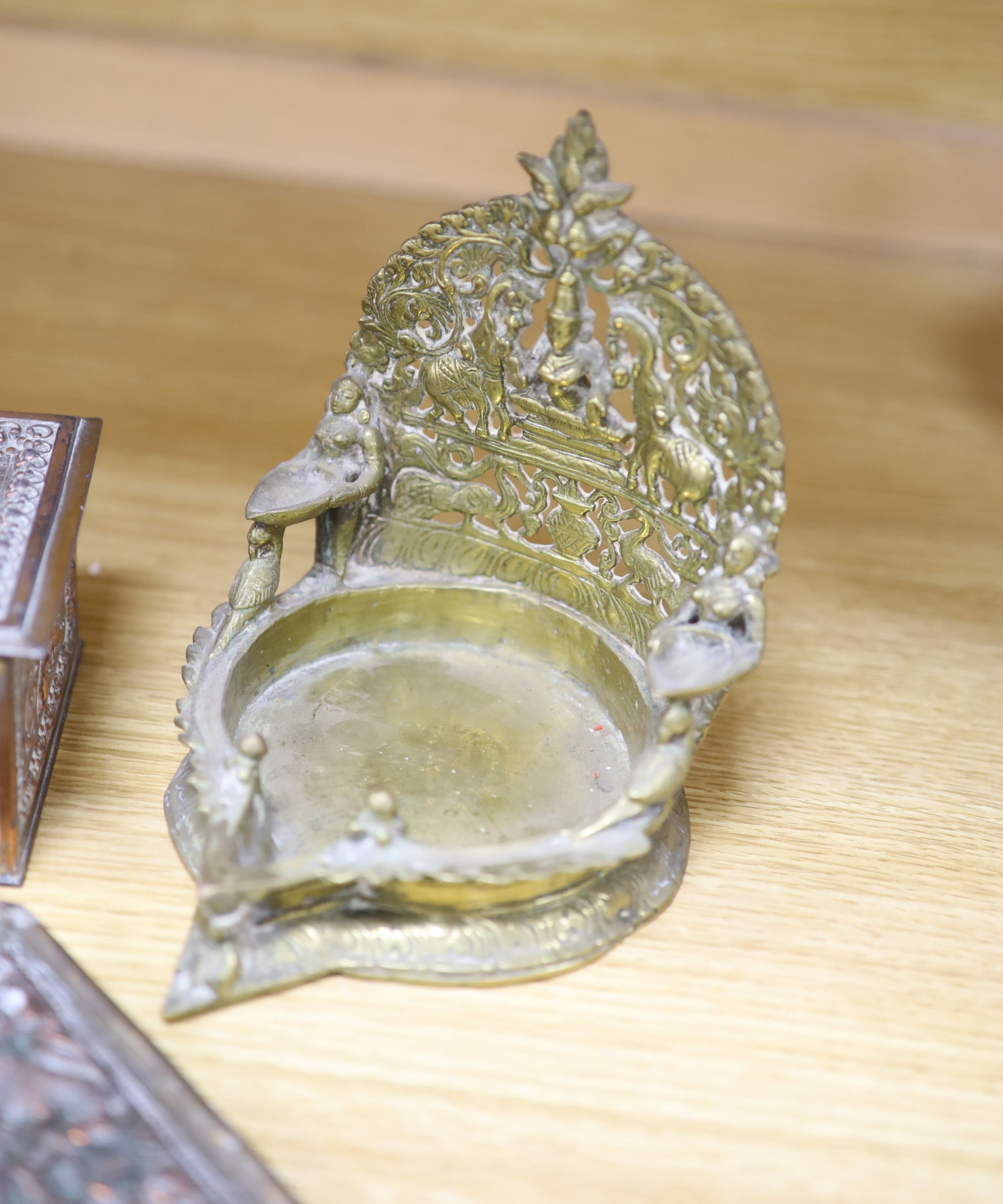 A pair of Indian cast metal trays and four other items, including a pair of octagonal embossed dishes, 46cm